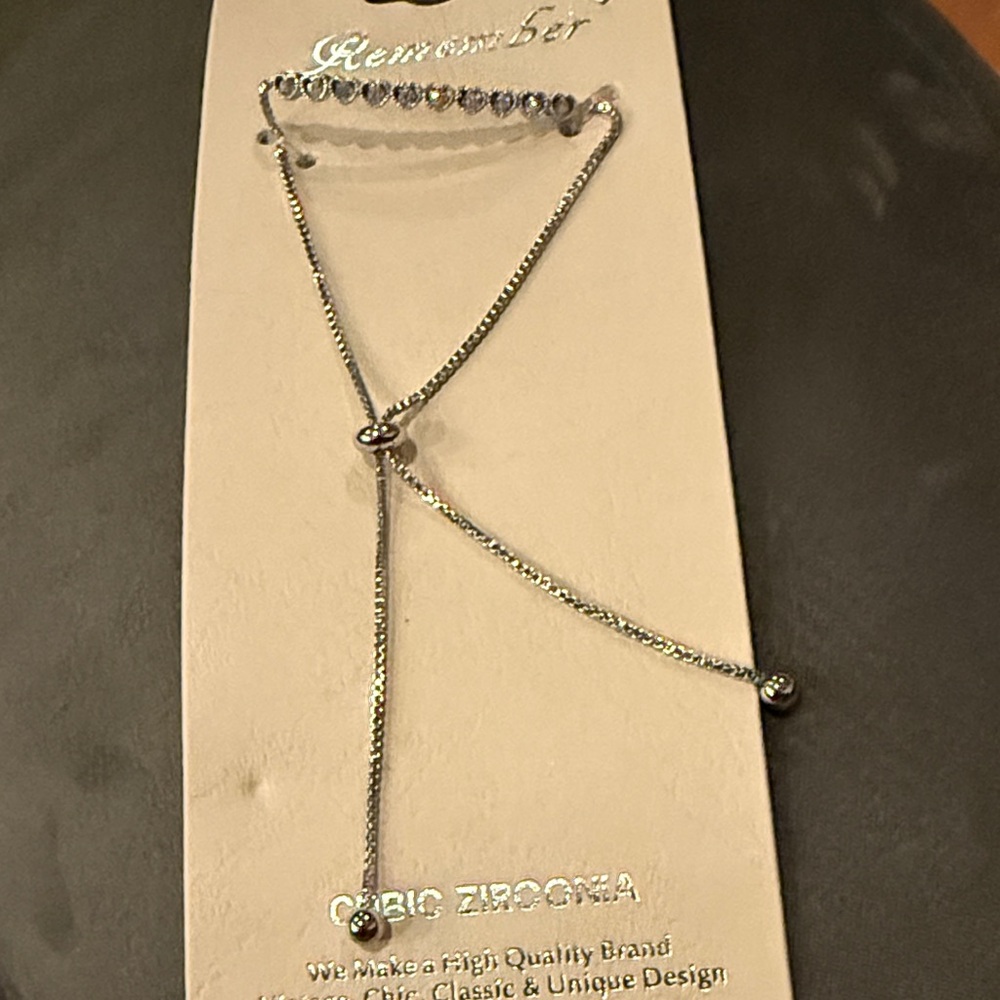 Stylish NWT Silver tone heart-shaped cubic zirconia adjustable Bracelet